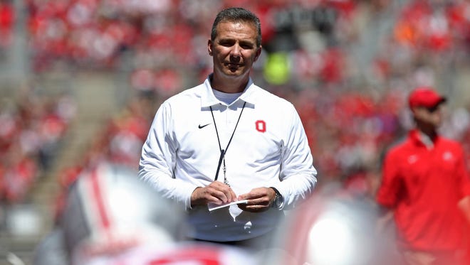 Ohio State coach Urban Meyer and his staff were at a camp in New Jersey on Wednesday to help their program but also to help a friend.