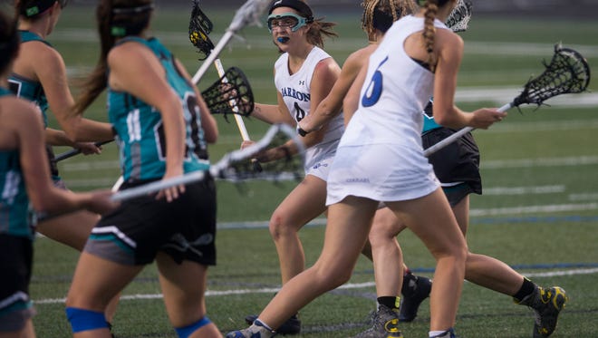 Barron Collier High School girls lacrosse plays Gulf Coast High School during the first half of a first-round play-in game in the state tournament at Barron Collier High School Wednesday, April 12, 2017. Barron Collier would go on to win. 
