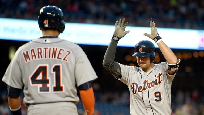 Tigers' Nick Castellanos (9) celebrates his two-run home run with Victor Martinez during the fourth inning.