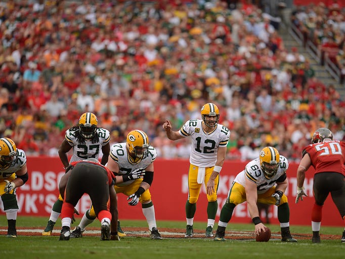 Green Bay Packers quarterback Aaron Rodgers gets ready