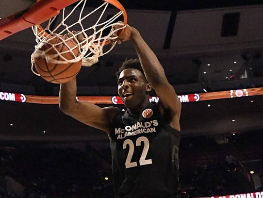 Mitchell Robinson (blocking the shot) has spent the