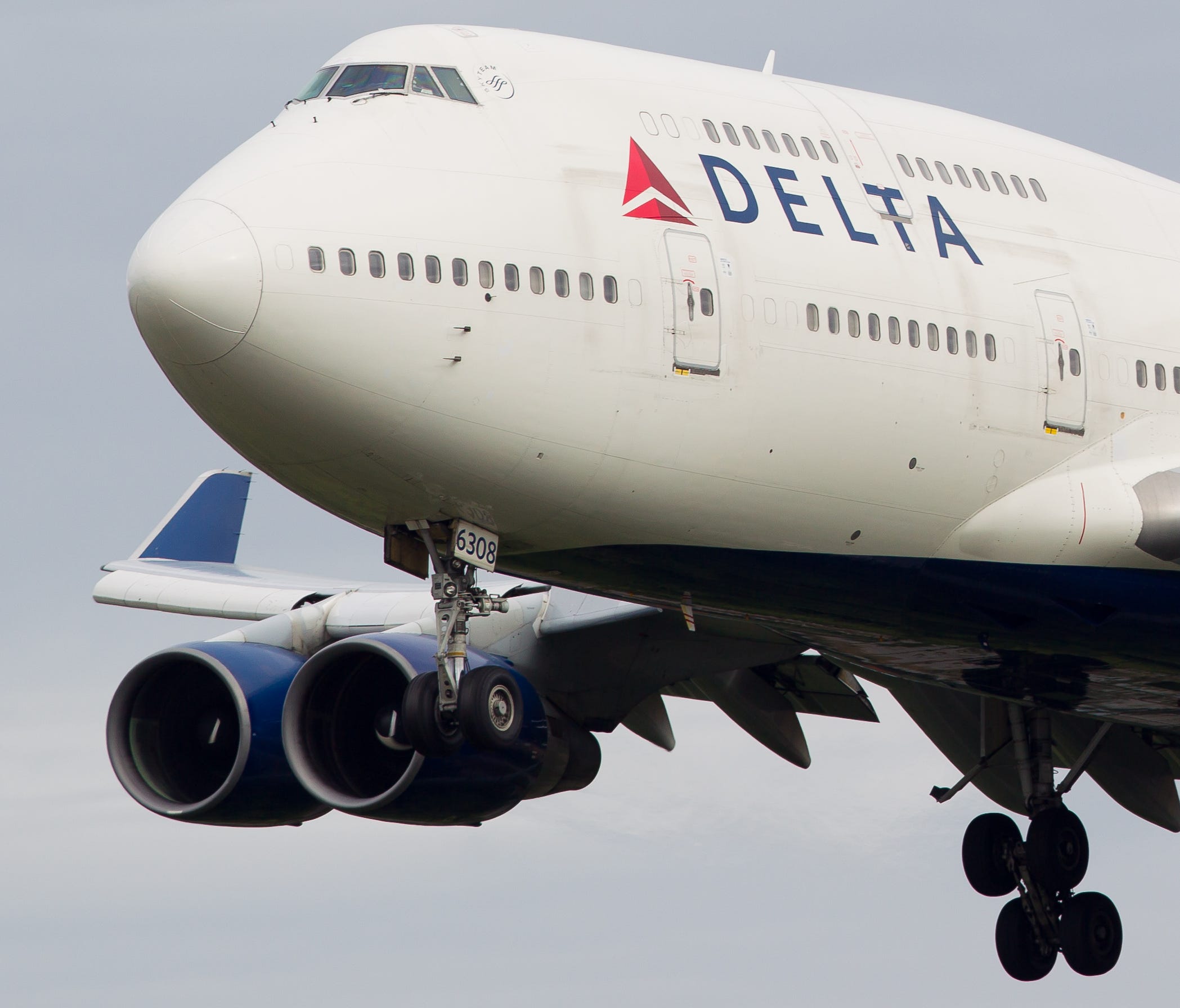 A Delta Air Lines Boeing 747-400 is seen in flight in June 2016.