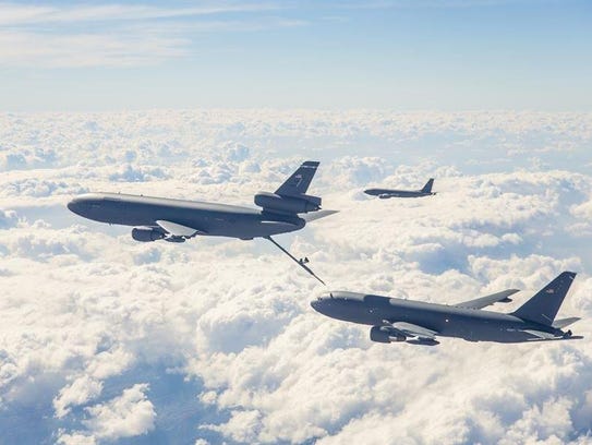 An Air Force KC-10 fuels a next-generation KC-46 on
