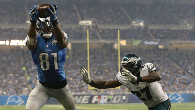 Detroit Lions Calvin Johnson catches a touchdown against the Philadelphia Eagles Malcolm Jenkins during second half actionThursday, November 26, 2015 at Ford Field in Detroit Michigan.