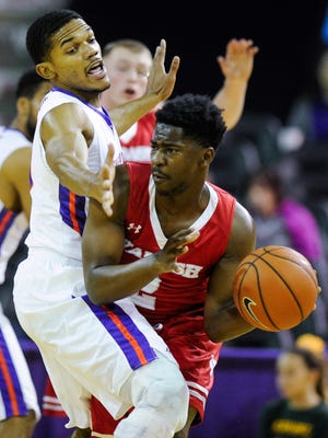 Evansville guard Duane Gibson (25) guards Wabash guard Ronald Ryan (2) during their game at the Ford Center in Evansville, Wednesday, Nov. 30, 2016. Evansville beat Wabash 83-39. 