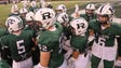 Ramapo football players are shown in the end zone before