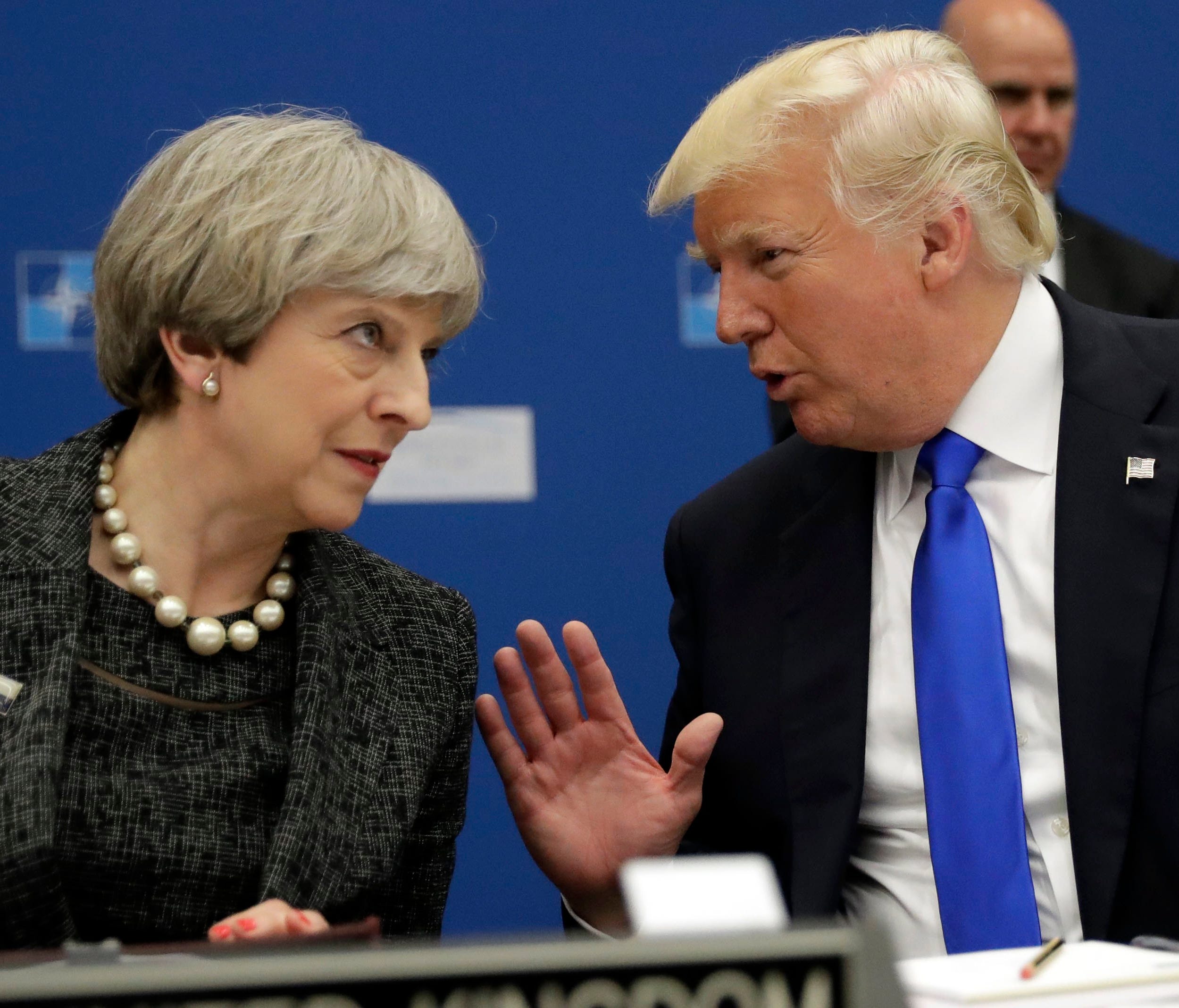 President Trump and British Prime Minister Theresa May speak during a working dinner meeting at the NATO summit in Brussels, Belgium, May 25, 2017.