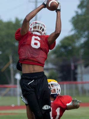 Port Huron senior Bobby Wright catches a pass during practice on Aug. 19 at Port Huron High School.