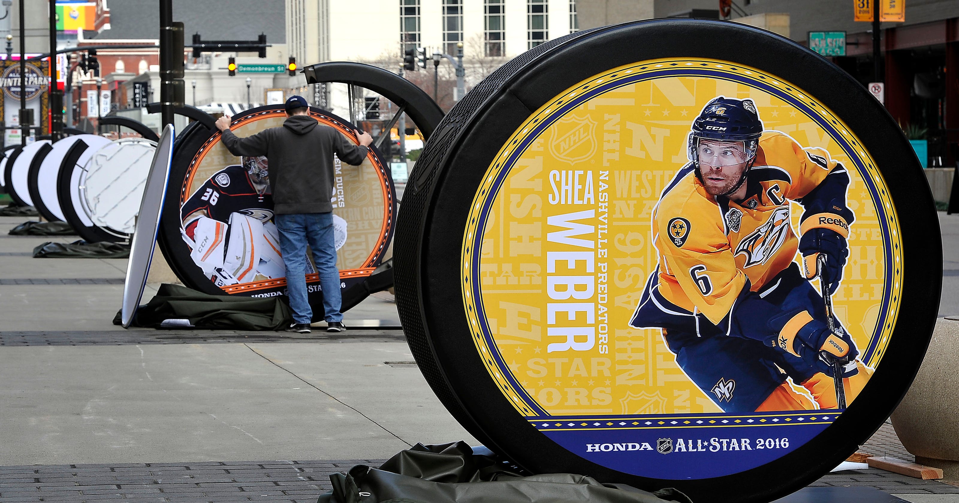 Giant hockey pucks honor NHL Allstars