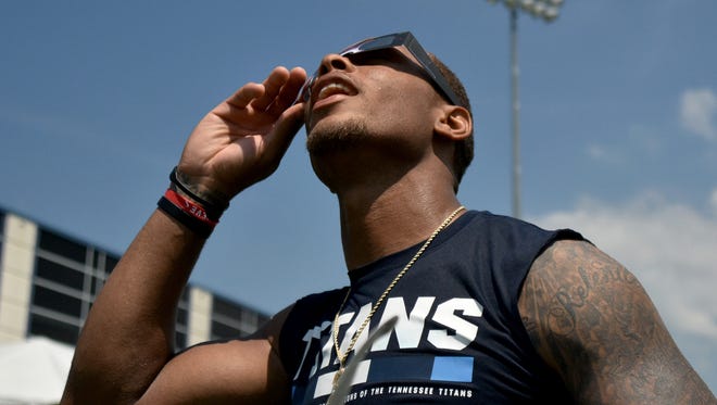 Some Titans players, such as Rishard Matthews, stayed on the practice field following totality to continue viewing the solar eclipse on Monday, Aug, 21, 2017.