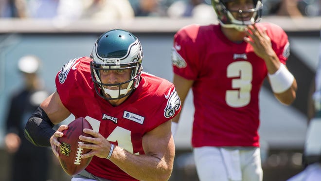 Eagles quarterback Tim Tebow (No. 11) practices at Lincoln Financial Field during training camp on Tuesday afternoon.