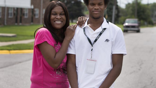 Levia Heffner, 37, and her son Jalen Heffner, 16, in Indianapolis in front of their home Thursday, August 7, 2014.