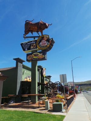 Barista’s has drawn criticism from Hurricane residents who are offended by the extremely large genitals of its bull sculpture, as seen from State Street on Wednesday, March 25, 2015.