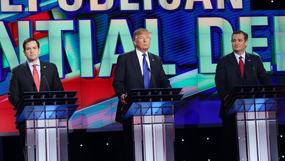 Marco Rubio, Donald Trump and Ted Cruz take part in