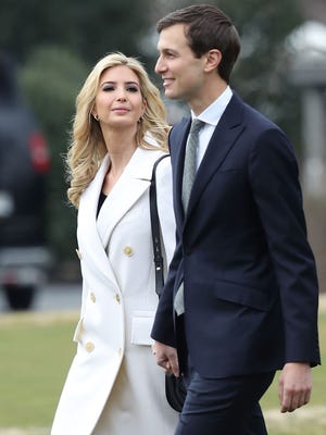 Jared Kushner, right, White House senior adviser, walks with his wife, Ivanka Trump, toward Marine One on Feb. 17, 2017, while departing from the White House to South Carolina to visit the Boeing plant.
