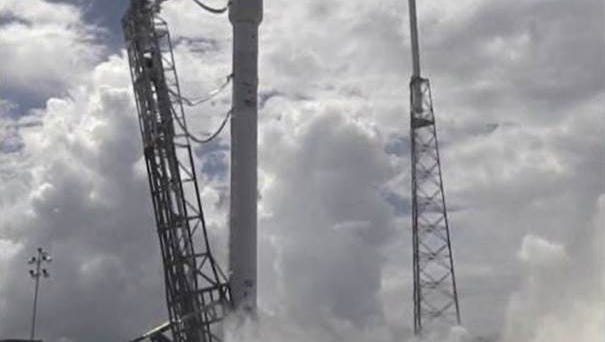 A SpaceX Falcon 9 rocket briefly fired its engines in a pre-launch test Friday at Cape Canaveral Air Force Station.