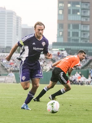 Louisville City FC forward Matt Fondy makes a move past Harrisburg City Islander goalie Nicholas Noble in route to scoring his second goal in the first half Wednesday night. Fondy would have three before the first half was finished. Sept. 3, 2015