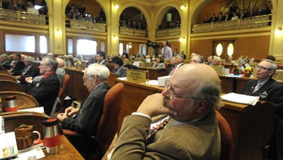 Legislators listen to the State of the State speech earlier this year.