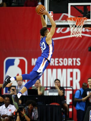 July 7: Knicks forward Kevin Knox throws down a monster two-handed slam against the Hawks.