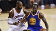 LeBron James defends Draymond Green during the second