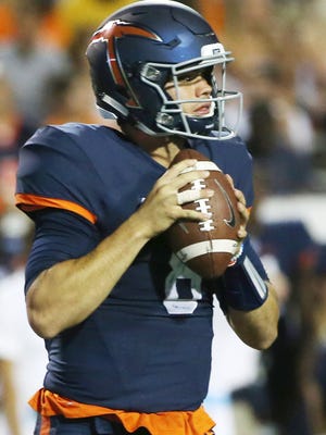 UTEP quarterback Zack Greenlee looks for a receiver Sept. 3 against New Mexico State.