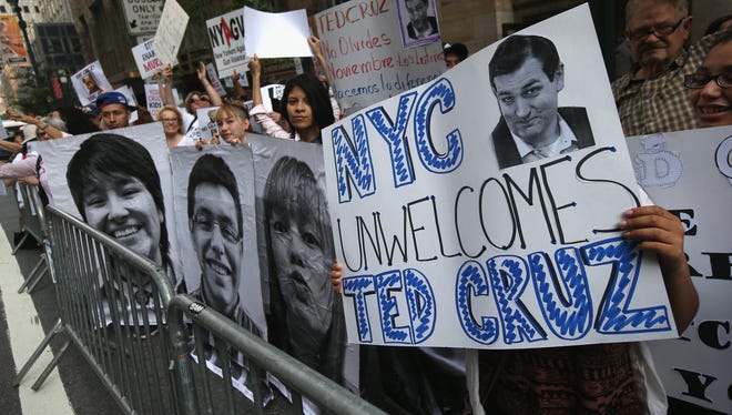 DREAM Act advocates protest outside a fundraiser for Sen. Ted Cruz, R-Texas., in New York City in May.