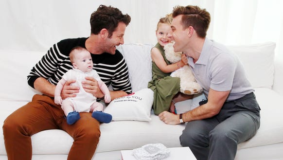 Nate Berkus and family sharing a happy moment