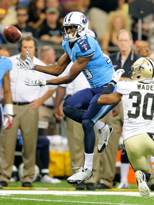 Titans wide receiver Justin Hunter makes a catch in the first half against the Saints on Friday. He caught four passes for 111 yards.