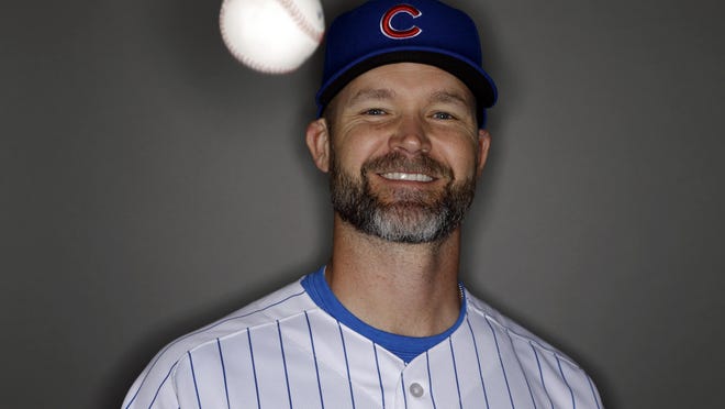 Chicago Cubs manager David Ross, shown posing for a photo in 2015 as a player, faces unique challenge in his first season at the helm.