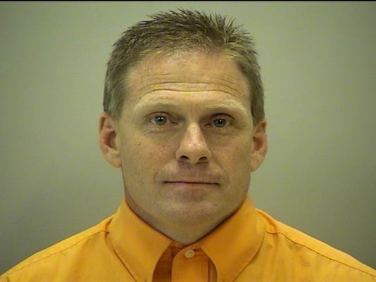 Imprisoned ex-teacher pleads guilty in Macomb County to 