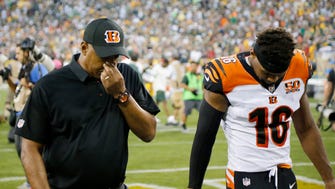 Cincinnati Bengals head coach Marvin Lewis walks to the locker room after overtime of the NFL Week 3 game between the Green Bay Packers and the Cincinnati Bengals at Lambeau Field in Green Bay on Sunday, Sept. 24, 2017. The Bengals were dropped to 0-3 after a 27-24 overtime loss in Green Bay.