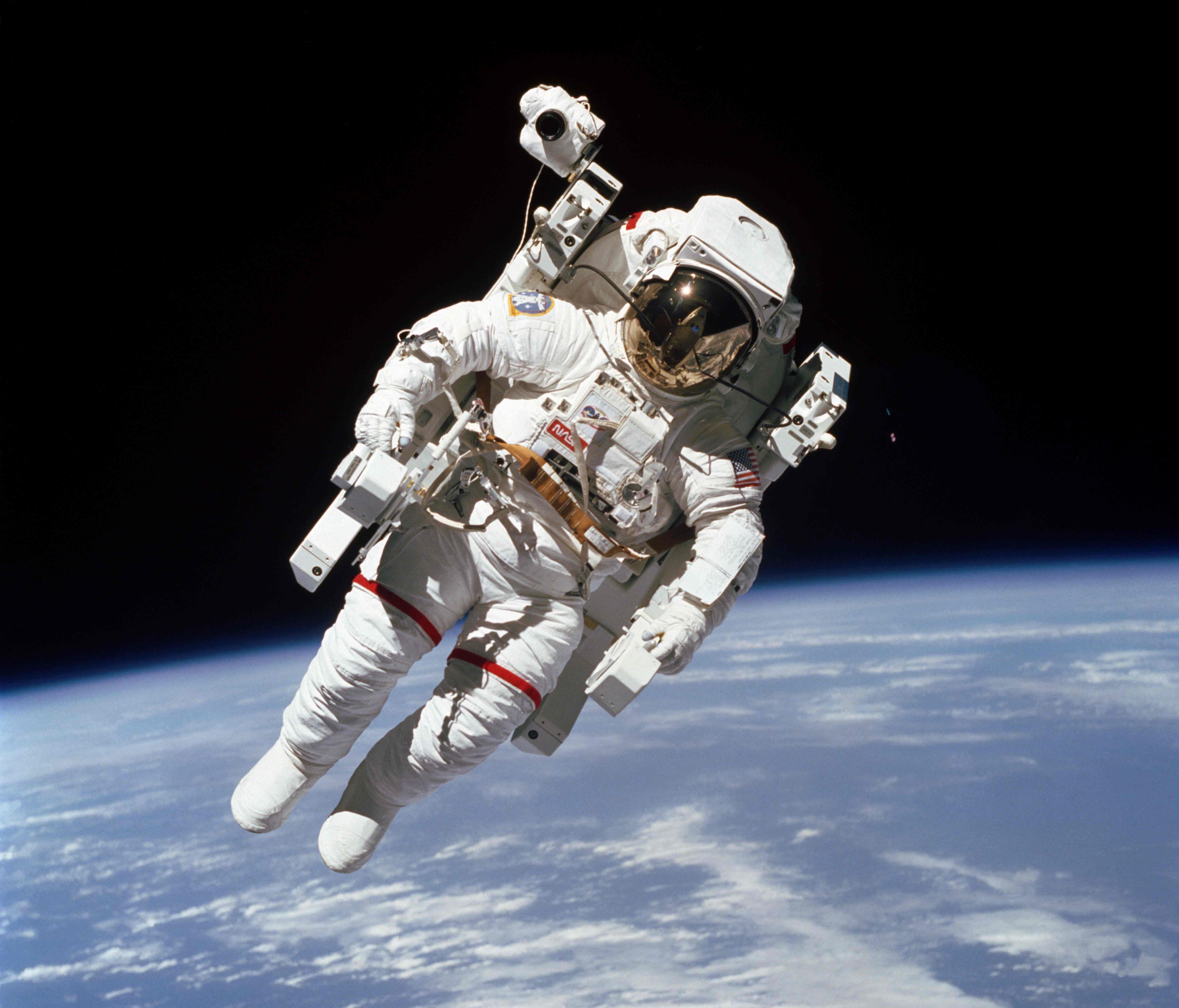 This photo taken on February 7, 1984, shows the first untethered spacewalk, NASA astronaut Bruce McCandless is in the midst of the first 