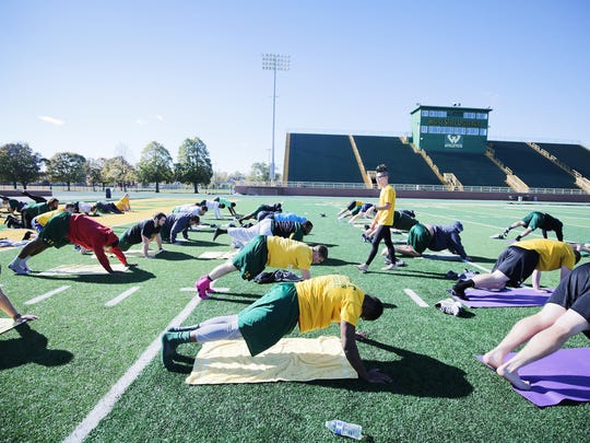 Wayne State Football Using Yoga To Limber Up After Game Days