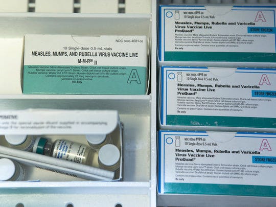 Boxes of single-dose vials of the measles-mumps-rubella