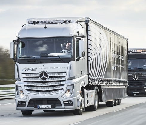 Self-driving trucks that can travel in automated convoys, like these Mercedes-Benz test vehicles, are one of several market opportunities for Daimler's driverless technology.