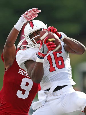 Indiana Hoosiers defensive back Jonathan Crawford (9) is unsuccessful in blocking a pass to Ball State Cardinals wide receiver KeVonn Mabon (16), leading to a first down for Ball State during second quarter action at Indiana University's Memorial Stadium, Bloomington, Ind., Saturday, September 10, 2016. 