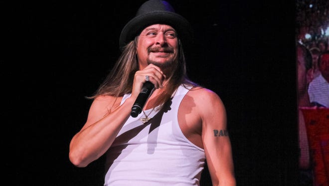 Kid Rock talks to the crowd during his performance at the DTE Energy Music Theatre on Saturday, Aug, 22, 2015, in Clarkston.