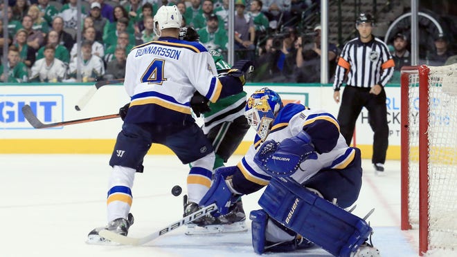 Blues goalie Brian Elliott blocks a shot on goal against the Dallas Stars in the first period in Game 1 on Friday night.