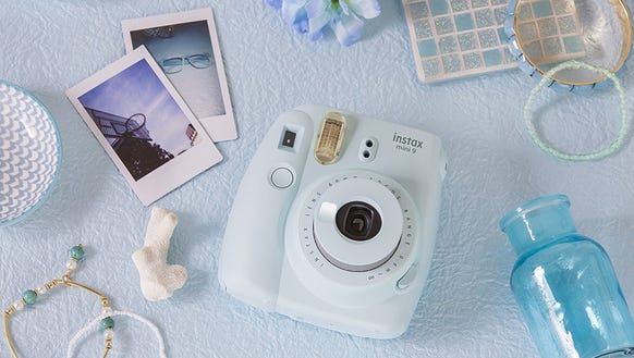   Take instant photos with instant gratification. 