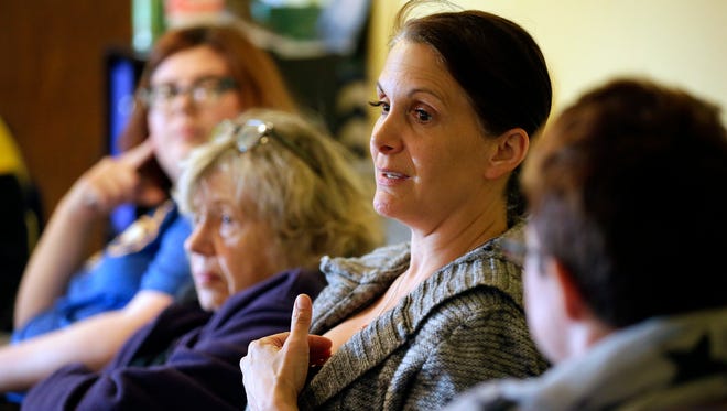 Phyllis Collar of Appleton participates in a community listening session Thursday at Iris Place in Appleton.