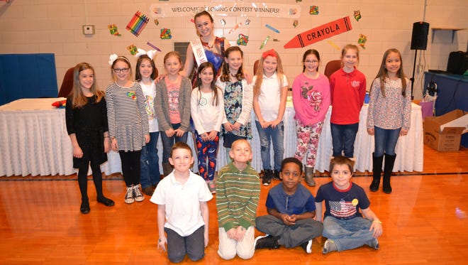 Pictured are 14 of the 17 winners of the 25th Annual Richland County Third Grade Coloring Contest, along with Miss Maple City Outstanding Teen 2018 Ellie Nickoli of Lexington.