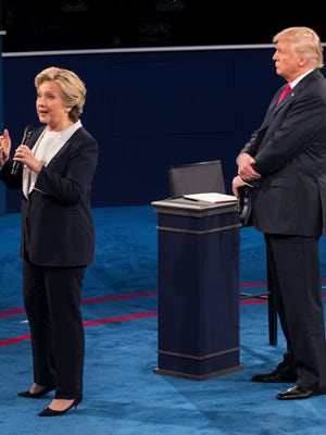 FILE-- Hillary Clinton and Donald Trump during their second presidential debate, at Washington University in St. Louis, Oct. 9, 2016. Clinton and Trump will meet on Oct. 19 at the University of Nevada, Las Vegas, for their final debate of the presidential election. The moderator, Chris Wallace of ÒFox News Sunday,Ó has divided the hour-and-a-half event into six 15-minute segments, to cover immigration, the Supreme Court, entitlements and debt, the economy, foreign policy and fitness for office. (Doug Mills/The New York Times)