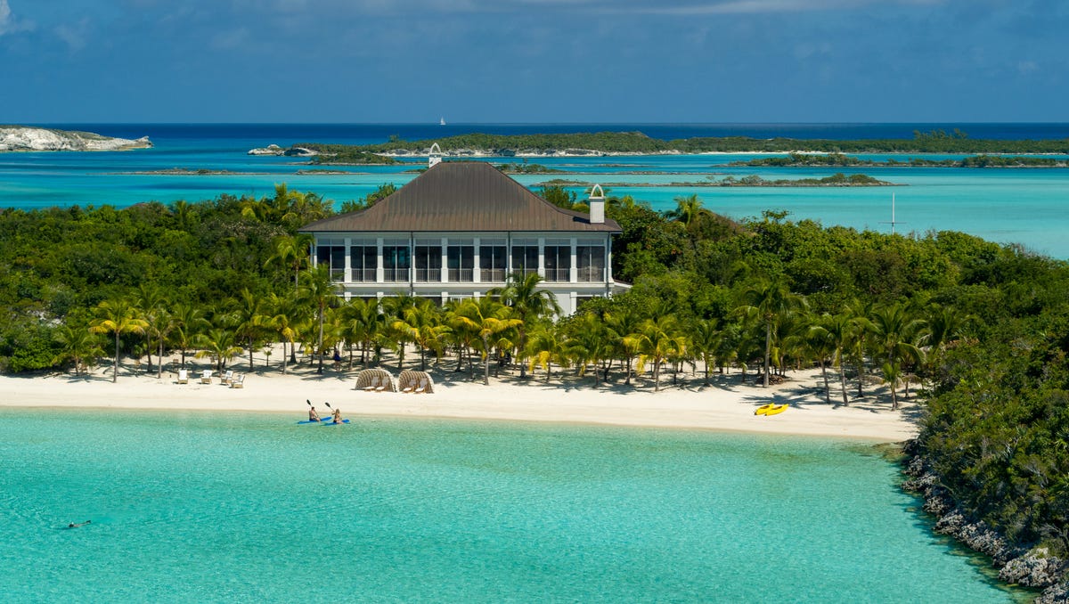 A number of houses and cottages are spread across Little Pipe Cay for family, guests and staff.