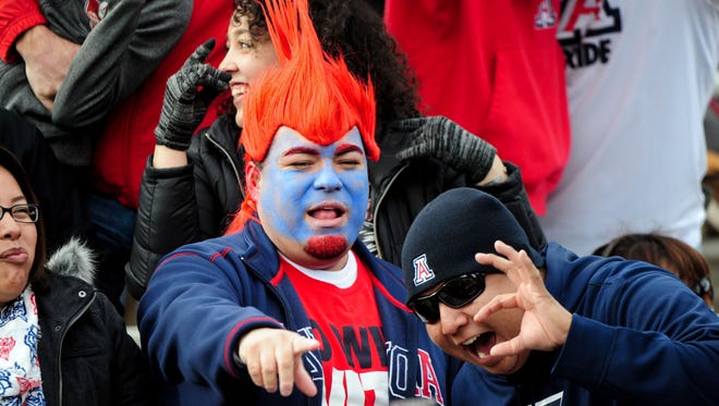 Arizona Wildcats fans react during the 2015 New Mexico Bowl game against the New Mexico Lobos at University Stadium in Albuquerque.