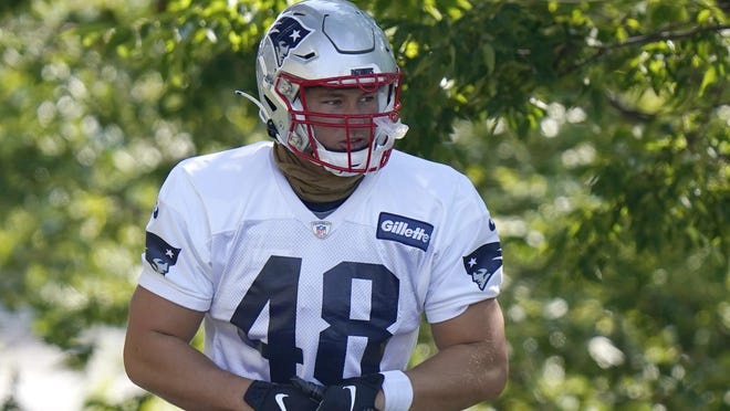 Patriots tight end Paul Quessenberry steps on the field before the start of a training camp practice in late August in Foxboro.
