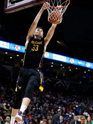 Montverde Academy (Montverde, Fla.) forward Lucas Turnage (33) slams a two-handed dunk during the 2017 Bass Pro Tournament of Champions dunk contest at JQH Arena in Springfield, Mo. on Jan. 14, 2017.