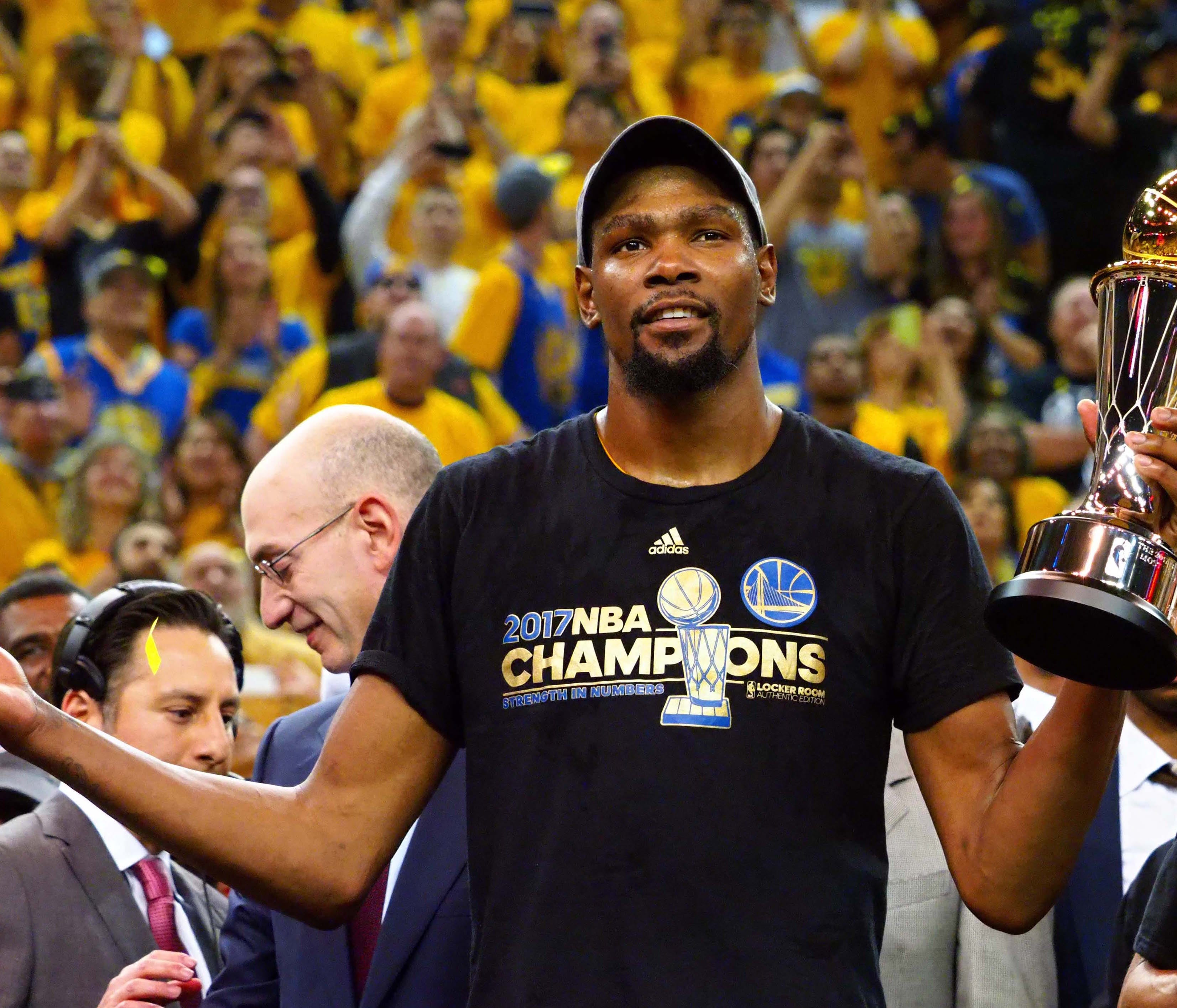Golden State Warriors forward Kevin Durant (35) celebrates after winning the NBA Fianls MVP in game five of the 2017 NBA Finals at Oracle Arena. Mandatory Credit: Kelley L Cox-USA TODAY Sports