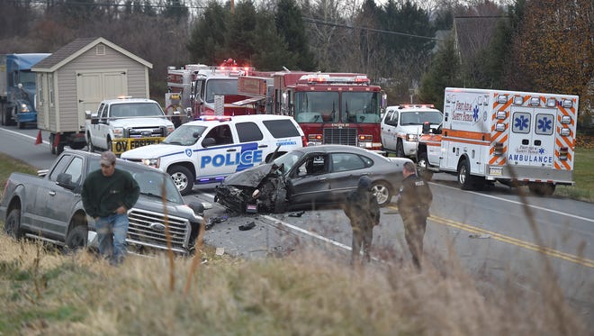 Firefighters had to free a woman trapped in her overturned vehicle after a three vehicle accident on Quentin Rd. just north of Zinns Mill Rd. Tuesday, Dec. 12. 