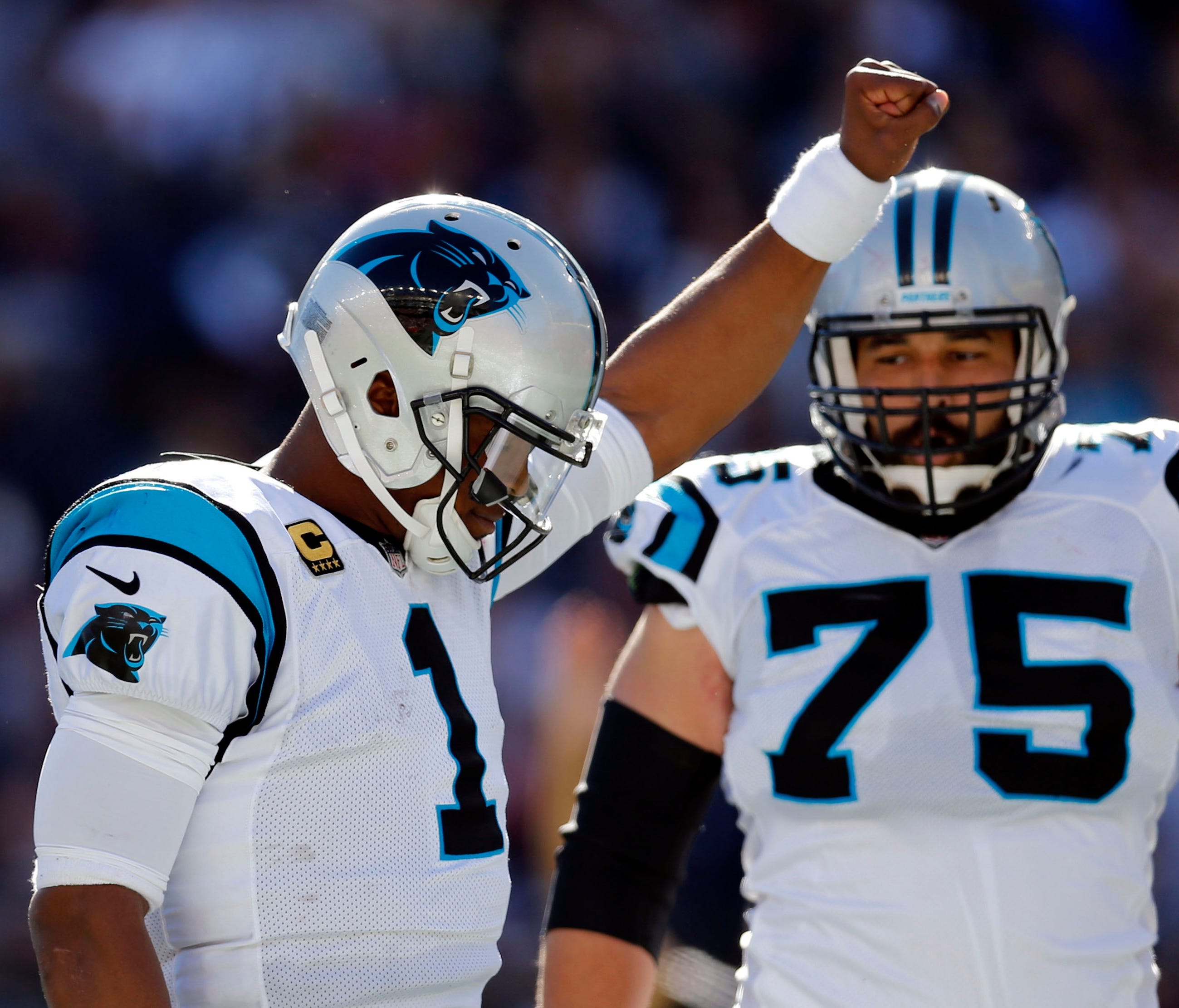 Cam Newton celebrates a touchdown during the second half against the New England Patriots.