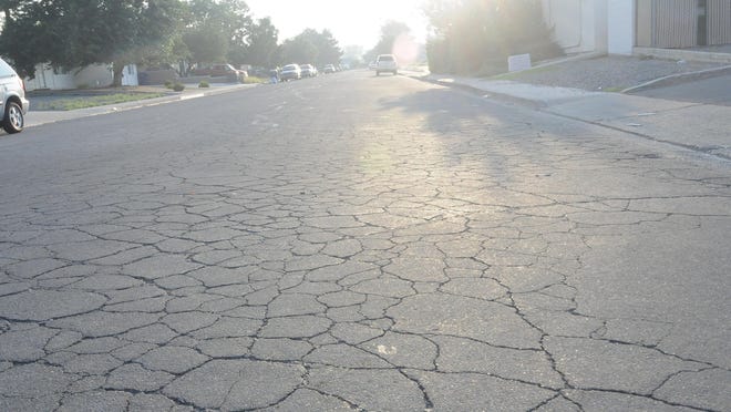 Cracks show in the pavement on B Street in Fernley. The City Council took a step toward creating a Pavement Management Plan, but will be looking for ways to fund it.
